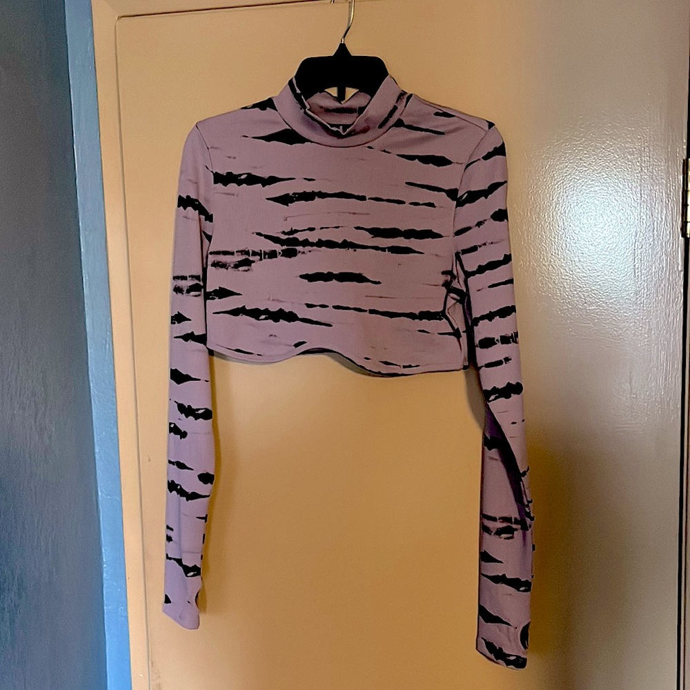 A Large purple patterned crop top.